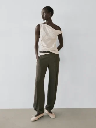 Asymmetrische top met knoopdetail