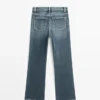 Boot-cut jeans met hoge taille Boot-cut jeans met hoge taille