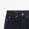 Boot-cut jeans met hoge taille en flockafwerking