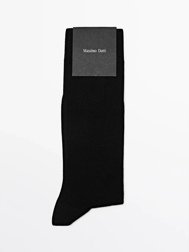 Effen gebreide sokken van een zijde-mix Effen gebreide sokken van een zijde-mix