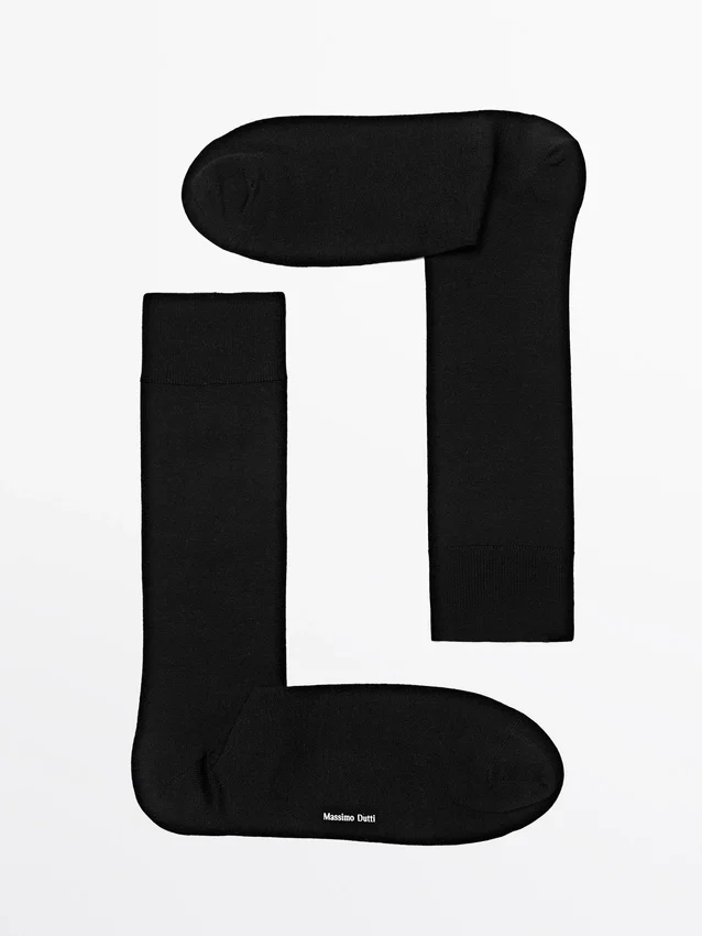 Effen gebreide sokken van een zijde-mix Effen gebreide sokken van een zijde-mix