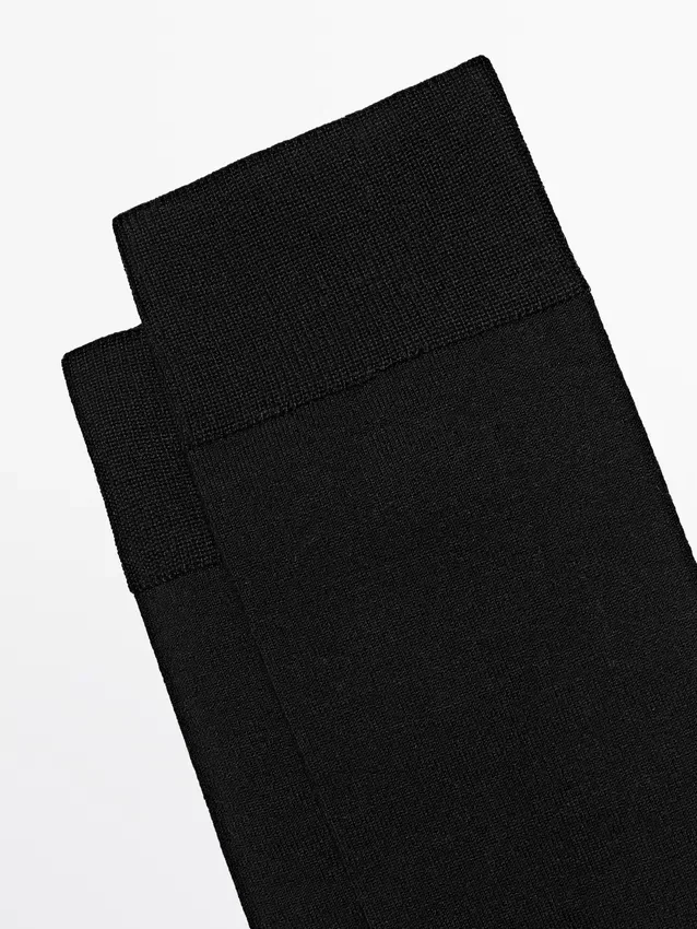 Effen gebreide sokken van een zijde-mix Effen gebreide sokken van een zijde-mix