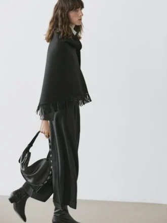 Gebreide cape van wolmix met franjes