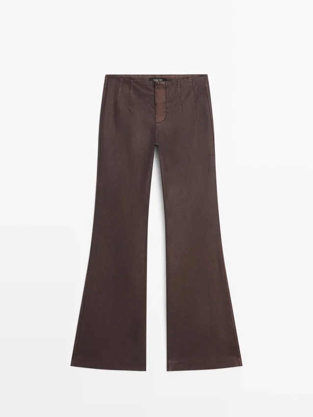 Gewaxt broek met uitlopende pijpen Gewaxt broek met uitlopende pijpen