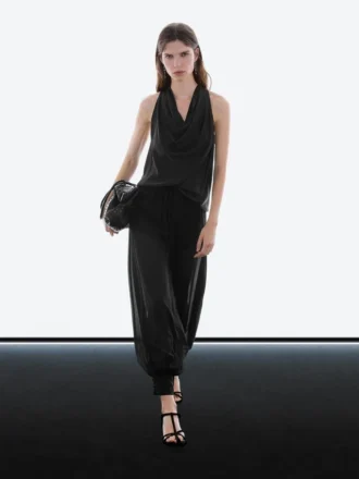 Halfdoorzichtige sarouelbroek met knoopdetails