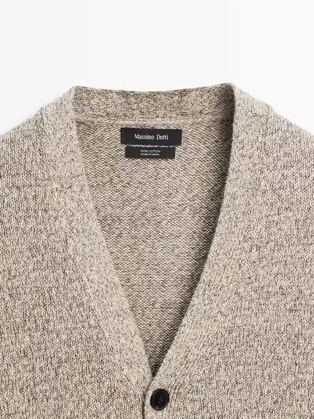 Katoenen gebreide Vesttrui met knopen Katoenen gebreide Vesttrui met knopen