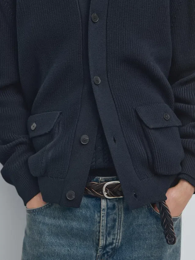 Katoenen gebreide Vesttrui met zakken Katoenen gebreide Vesttrui met zakken