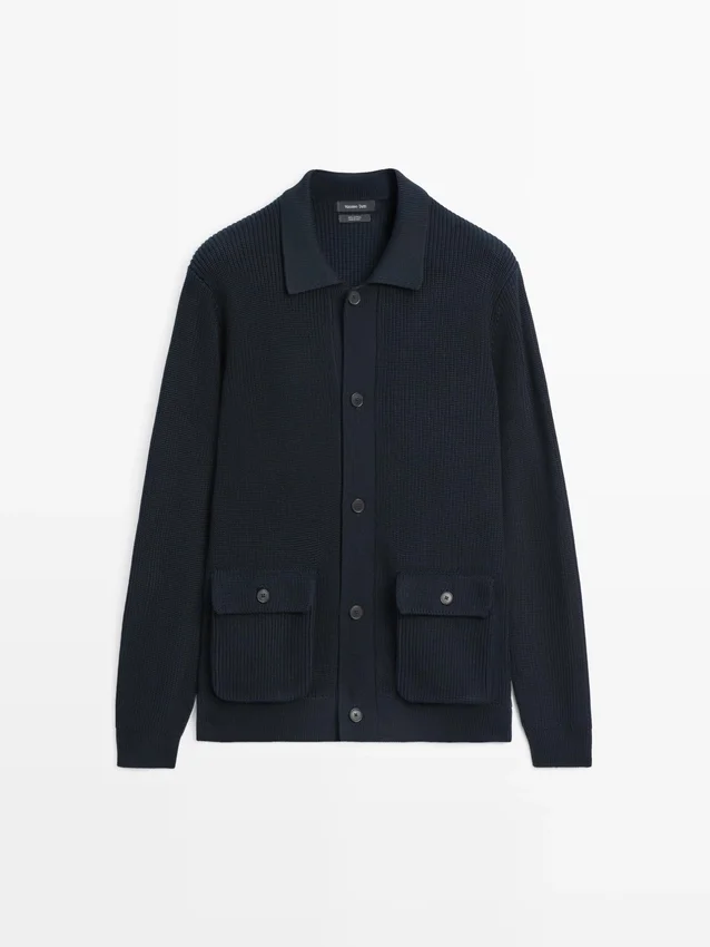 Katoenen gebreide Vesttrui met zakken Katoenen gebreide Vesttrui met zakken