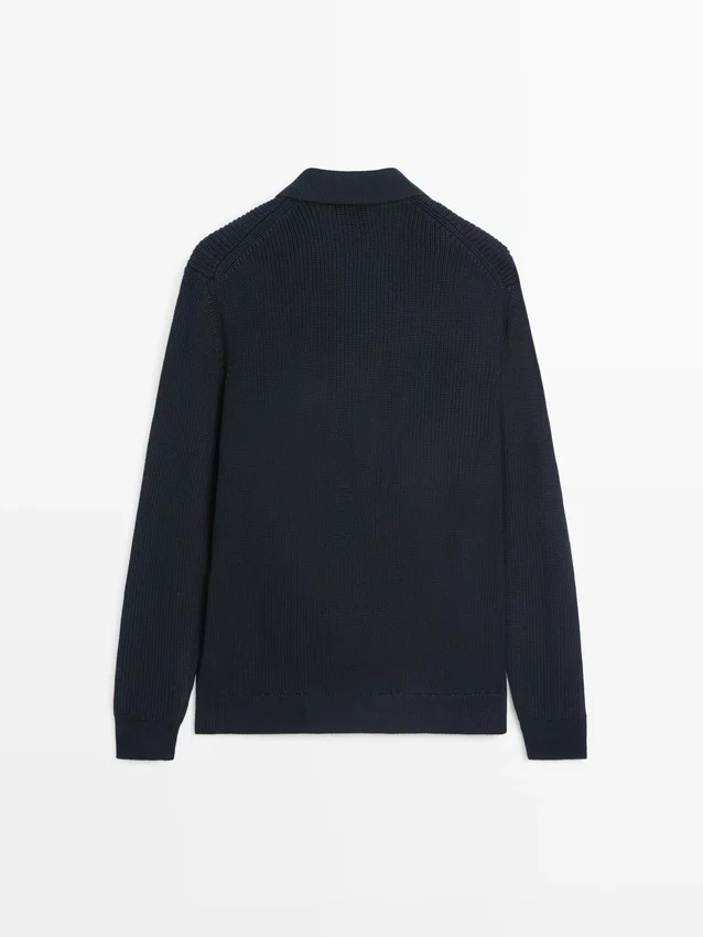 Katoenen gebreide Vesttrui met zakken Katoenen gebreide Vesttrui met zakken