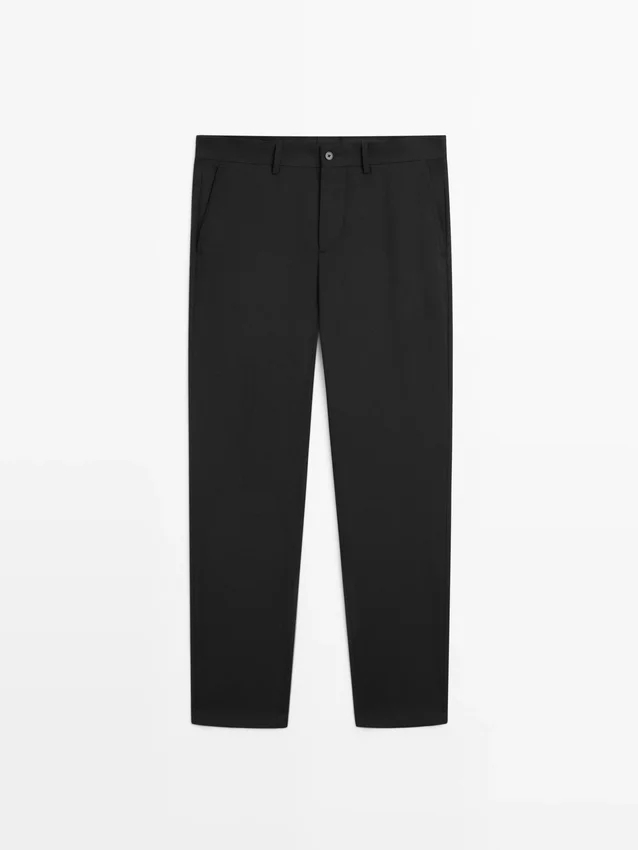 Kostuumbroek met wijde pijpen van koele wol Kostuumbroek met wijde pijpen van koele wol