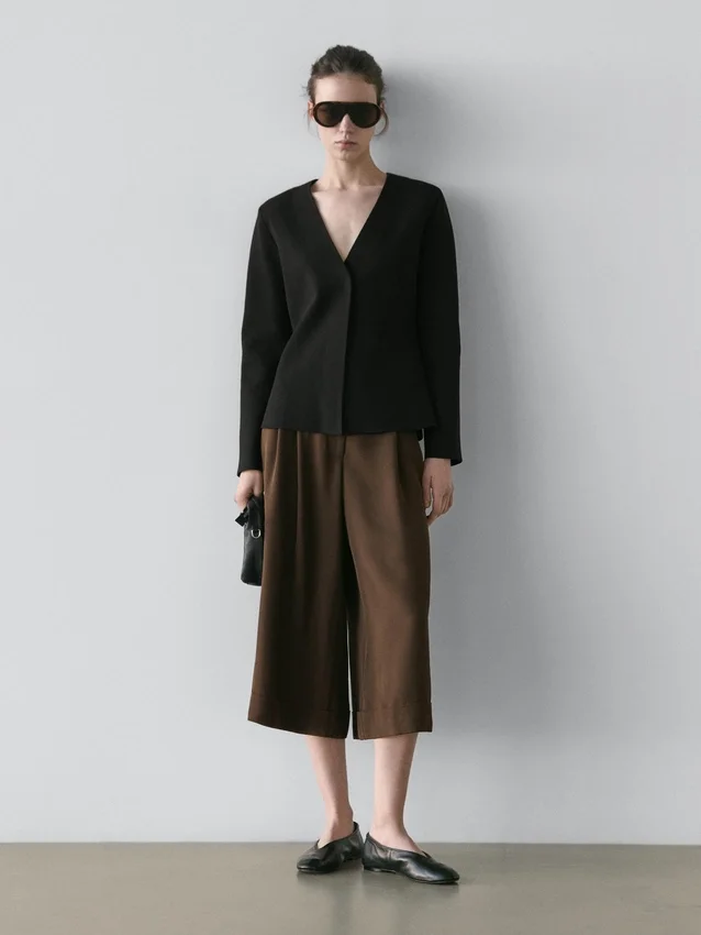 Lange bermuda met omgeslagen zomen Lange bermuda met omgeslagen zomen