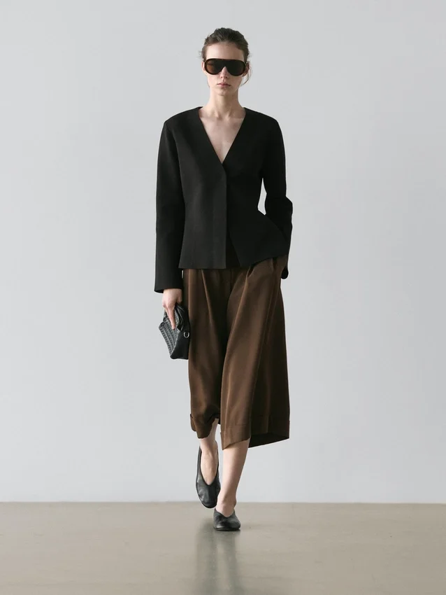 Lange bermuda met omgeslagen zomen Lange bermuda met omgeslagen zomen