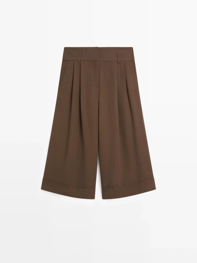 Lange bermuda met omgeslagen zomen Lange bermuda met omgeslagen zomen