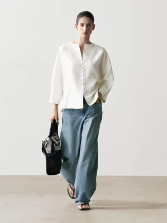 Linnen jasje met knoopdetails