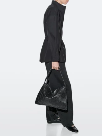 Middelgrote gevlochten leren schoudertas