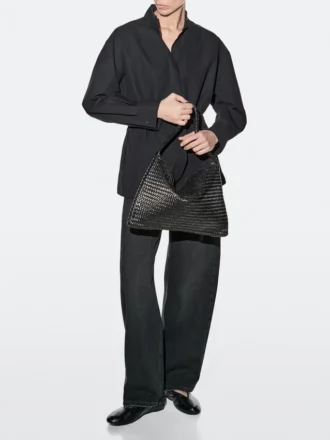 Middelgrote gevlochten leren schoudertas