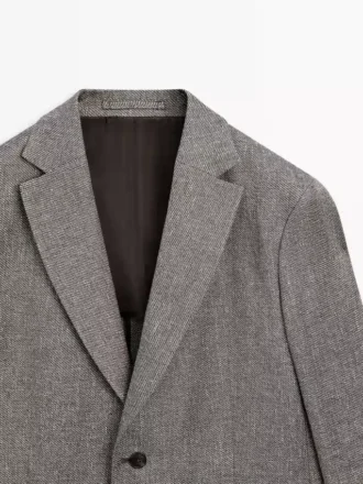 Op maat gemaakte blazer van linnenmix met visgraatmotief