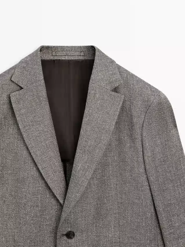 Op maat gemaakte blazer van linnenmix met visgraatmotief Op maat gemaakte blazer van linnenmix met visgraatmotief