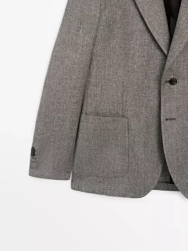 Op maat gemaakte blazer van linnenmix met visgraatmotief Op maat gemaakte blazer van linnenmix met visgraatmotief