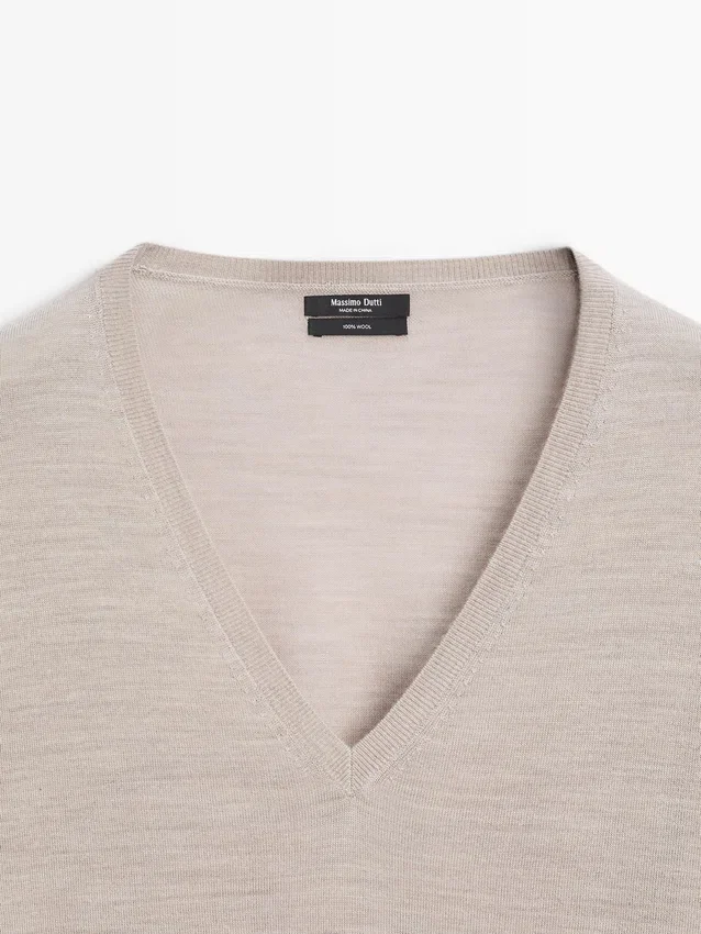 Oversized gebreide trui met V-hals Oversized gebreide trui met V-hals