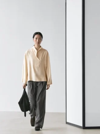 Soepelvallende blouse met borststuk