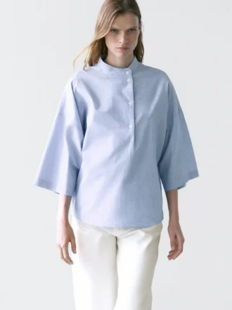 Soepelvallende blouse met knoopkraag