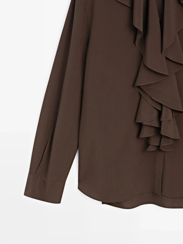 Soepelvallende blouse met ruches Soepelvallende blouse met ruches