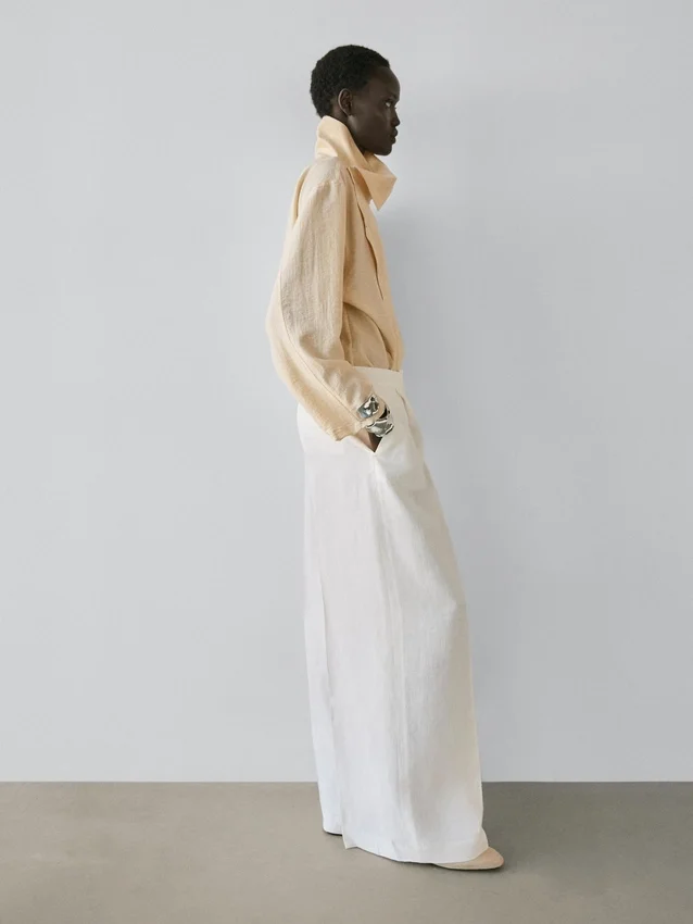 Soepelvallende linnen broek voor het kostuum Soepelvallende linnen broek voor het kostuum