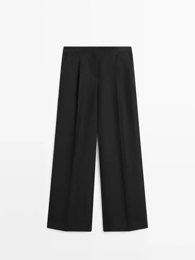 Soepelvallende linnen broek voor het kostuum Soepelvallende linnen broek voor het kostuum