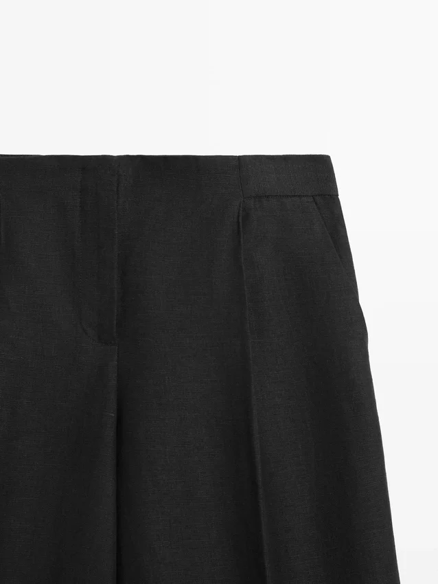 Soepelvallende linnen broek voor het kostuum Soepelvallende linnen broek voor het kostuum