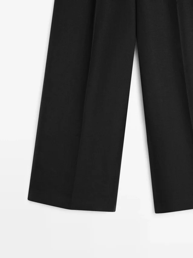 Soepelvallende linnen broek voor het kostuum Soepelvallende linnen broek voor het kostuum