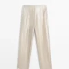Soepelvallende metallic linnen broek