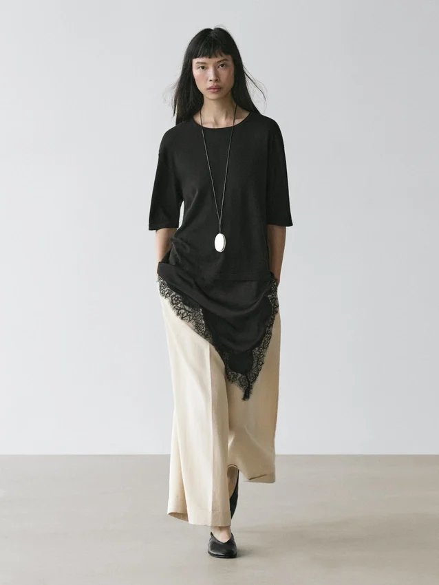 Trui met contrasterende kanten details Trui met contrasterende kanten details